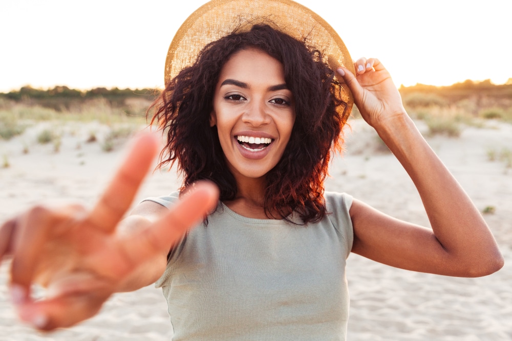 Close,Up,Of,Happy,Young,African,Girl,In,Summer,Hat