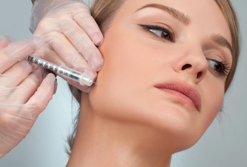 Woman,Is,Getting,Filler,Injection,In,Cheeks.,Anti-aging,Treatment,And